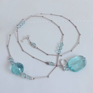 Silver necklace with blue stones